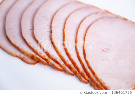 Ham texture closeup. Detailed sliced ham surface view. Closeup of ham with crust and marbling detail. Highdetail macro image of sliced ham with crust and marbling Ham texture closeup. Detailed sliced ham surface view. Closeup of ham with crust and marbling detail. Highdetail macro image of sliced ham with crust and marbling 136401736