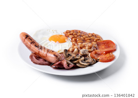 Full English breakfast with fried egg, bacon, sausages and beans isolated on white background Full English breakfast with fried egg, bacon, sausages and beans isolated on white background 136401842