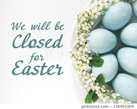Signboard with the inscription We will be closed for Easter 136401904