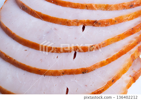 Detailed image of roasted meat. Highresolution photograph showing overlapping roasted meat slices. Closeup detailed image capturing textures of sliced seasoned roasted meat Detailed image of roasted meat. Highresolution photograph showing overlapping roasted meat slices. Closeup detailed image capturing textures of sliced seasoned roasted meat 136402212