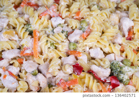 Creamy pasta for busy schedules. Tasty pasta that is easy to carry and quickly warm up. Enjoy flavorful and convenient pasta meal perfect for hectic daily routines 136402571