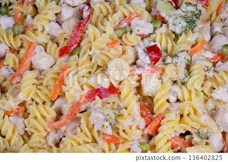 Prepared pasta meals. Creamy spiral pasta with vegetables. Chilled rotini with vegetables and cheese. Meal prep tray of creamy spiral pasta with vegetables and cheese 136402825