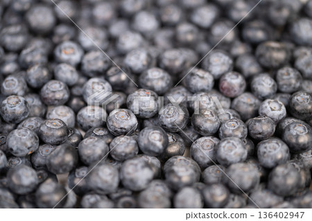 Healthy snack with fresh berries. Natural blueberries ideal for health visuals. Vibrant fresh blueberries suitable for promoting healthy eating and lifestyle content Healthy snack with fresh berries. Natural blueberries ideal for health visuals. Vibrant fresh blueberries suitable for promoting healthy eating and lifestyle content 136402947