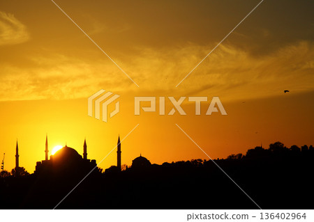 Sillhouette of Istanbul at sunset. Ramadan time with the muslim city istanbul silhouette Sillhouette of Istanbul at sunset. Ramadan time with the muslim city istanbul silhouette 136402964