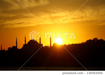 Sillhouette of Istanbul at sunset. Ramadan time with the muslim city istanbul silhouette Sillhouette of Istanbul at sunset. Ramadan time with the muslim city istanbul silhouette 136403008
