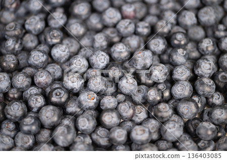 Healthy berries stand out. Vivid berries accentuate nutritious meal selection. Juicy clusters of berries represent nutritious and plantbased meal option to start day 136403085