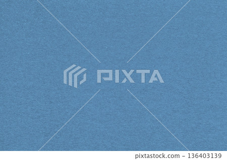 Blue textured paper background with subtle grain surface and soft structure. Paper backdrop, macro Blue textured paper background with subtle grain surface and soft structure. Paper backdrop, macro 136403139