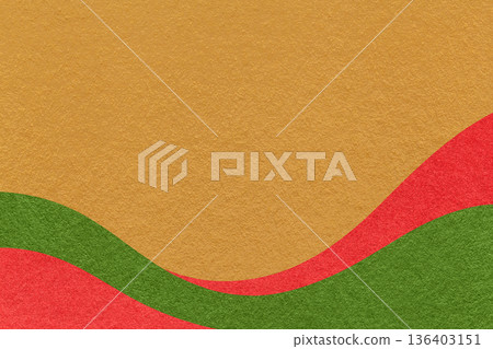 Textured dark golden paper background with red and green wavy lines and waves, copy space for banner, presentation 136403151