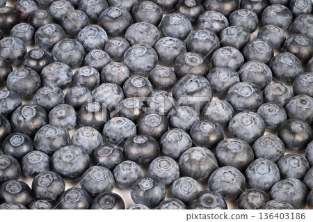 Rural harvest imagery. Sunkissed berry basket symbolizes orchard harvest and freshness. Rustic scene featuring blueberries emphasizing farmfresh and seasonal themes 136403186