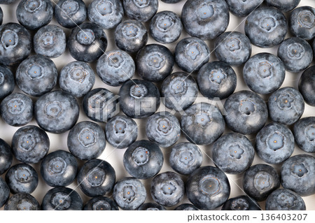 Macro blueberry texture showing bloom and skin details, even soft lighting, repetitive pattern, ideal for packaging, editorial food design and ingredient closeups Macro blueberry texture showing bloom and skin details, even soft lighting, repetitive pattern, ideal for packaging, editorial food design and ingredient closeups 136403207