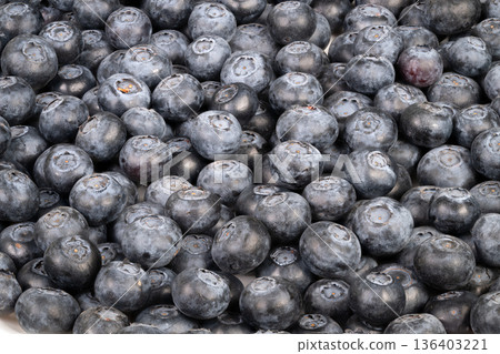 Dense blueberry pattern creating background, uniform repetition and mosaic surface in cool monochrome hues, versatile for packaging, web and branding mockups 136403221
