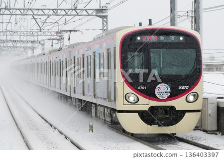 Keio 2000 series 2701F running in the snow 136403397