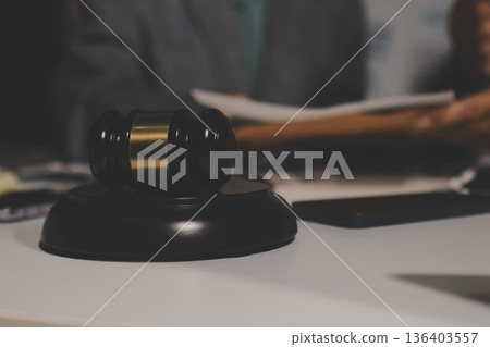 Businesswoman and Male lawyer or judge consult and conference having team meeting with client at law firm in office, Law and Legal services concept 136403557