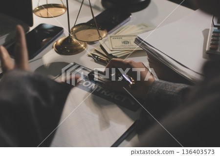 Businesswoman and Male lawyer or judge consult and conference having team meeting with client at law firm in office, Law and Legal services concept Businesswoman and Male lawyer or judge consult and conference having team meeting with client at law firm in office, Law and Legal services concept 136403573