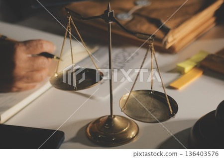 Businesswoman and Male lawyer or judge consult and conference having team meeting with client at law firm in office, Law and Legal services concept Businesswoman and Male lawyer or judge consult and conference having team meeting with client at law firm in office, Law and Legal services concept 136403576