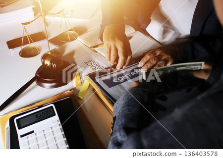 Businesswoman and Male lawyer or judge consult and conference having team meeting with client at law firm in office, Law and Legal services concept 136403578
