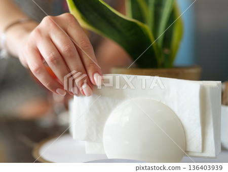 Setting the table with elegance for a cozy gathering at home during a warm afternoon 136403939