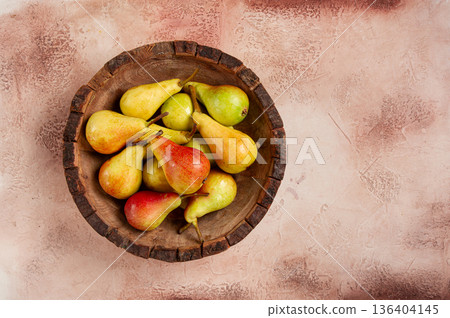 pears, Duchess variety, small pears, early harvest, in a wooden plate, top view, no people, pears, Duchess variety, small pears, early harvest, in a wooden plate, top view, no people, 136404145