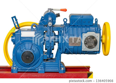 Bright blue electric motor stands ready for industrial use and showcases modern engineering design 136405908