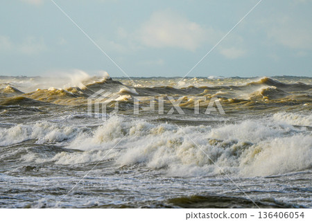 Powerful Baltic Sea storm with massive crashing waves and spray during turbulent weather Powerful Baltic Sea storm with massive crashing waves and spray during turbulent weather 136406054