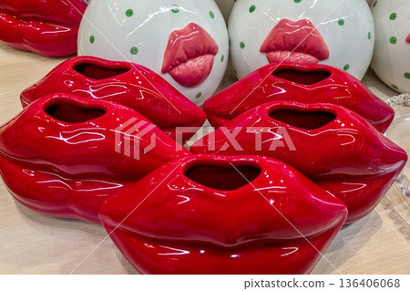 Red lips ceramic vases with romantic design displayed for Valentines Day decoration Red lips ceramic vases with romantic design displayed for Valentines Day decoration 136406068