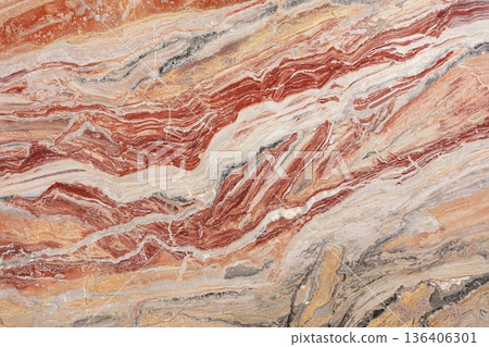 Beautiful natural stone with flowing patterns and vibrant colors found in a serene location Beautiful natural stone with flowing patterns and vibrant colors found in a serene location 136406301