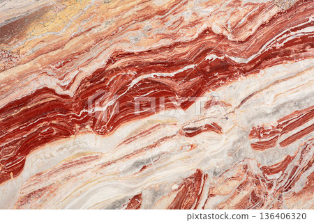 Stunning layers of red and white marble exhibit nature artistry at its finest Stunning layers of red and white marble exhibit nature artistry at its finest 136406320