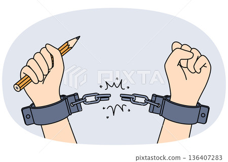 Hands of handcuffed reporter at moment of liberation, holding pencil to write honest investigative journalism. Liberation of man from shackles, as metaphor for emergence of free mass media Hands of handcuffed reporter at moment of liberation, holding pencil to write honest investigative journalism. Liberation of man from shackles, as metaphor for emergence of free mass media 136407283