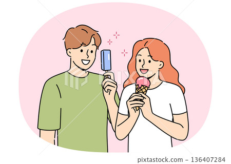 Man and woman eat ice cream to refresh themselves and satisfy hunger during summer walk Man and woman eat ice cream to refresh themselves and satisfy hunger during summer walk 136407284