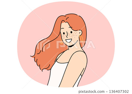 Attractive woman with freckles on face smiles and looks at screen demonstrating natural beauty 136407302