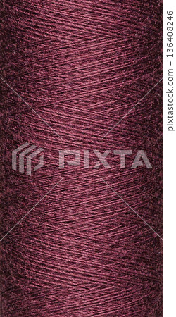 macro texture of a skein of brown sewing thread 136408246