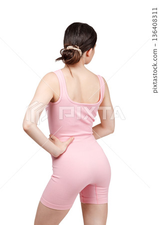 Sports jacket of pink color, women's sports suit seamless, jacket for yoga training on a girl on an isolated white background Sports jacket of pink color, women's sports suit seamless, jacket for yoga training on a girl on an isolated white background 136408311