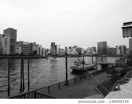 Tsukudajima's downtown atmosphere intersects with modern buildings in this urban landscape 136408336