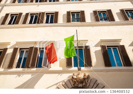 Italian flags on historic building facade in Rome Italian flags on historic building facade in Rome 136408532