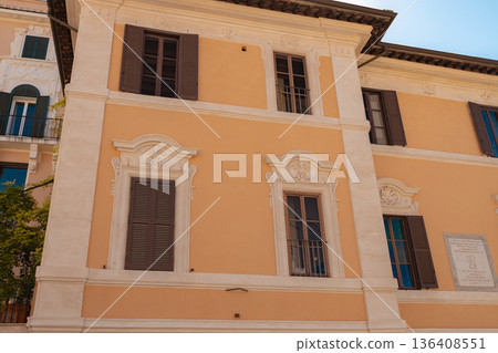 Historic residential building facade in Rome city center Historic residential building facade in Rome city center 136408551
