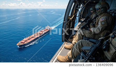 Soldiers in helicopter patrolling over cargo ship in ocean. Military maritime security operation aerial view 136409096