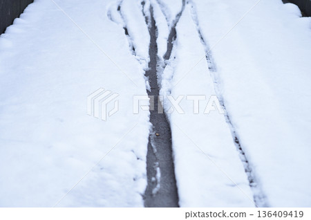 Snow and sidewalk Snow and sidewalk 136409419