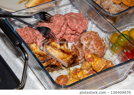 Platter of raw meat for gourmets Platter of raw meat for gourmets 136409876