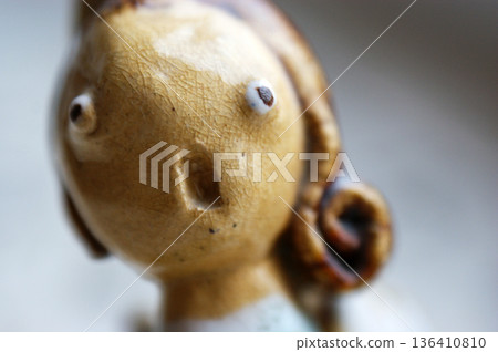 clay figurine in the shape of an angel praying clay figurine in the shape of an angel praying 136410810