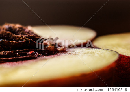 close-up of cut peach and stone shapes 136410848