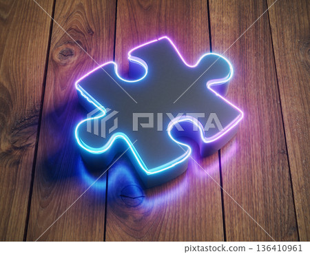 Lighted puzzle piece resting on wooden surface creating a modern look at night scene in a cozy room 136410961