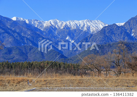 Azumino in winter: The Northern Alps seen from the foot of the mountain 136411382