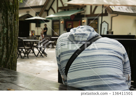 A peaceful moment on the wooden deck 136411501