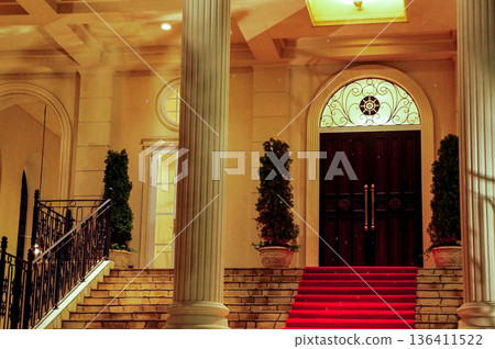 Red carpet entrance to a luxurious building Red carpet entrance to a luxurious building 136411522