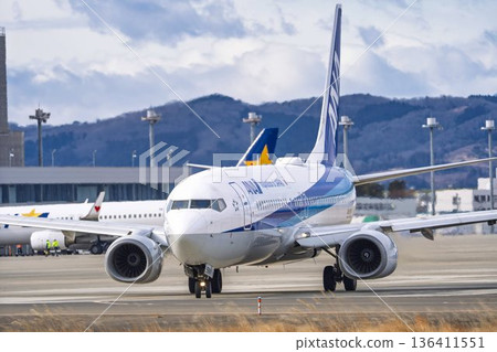Sendai Airport in winter, airplane taxiing, Natori City, Miyagi Prefecture Sendai Airport in winter, airplane taxiing, Natori City, Miyagi Prefecture 136411551
