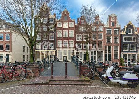 Traditional Canal Houses with Bicycles in Amsterdam, Netherlands Traditional Canal Houses with Bicycles in Amsterdam, Netherlands 136411740