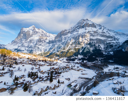 Wetterhorn and Schreckhorn Mountains and Grindelwald Town in Winter. Switzerland Wetterhorn and Schreckhorn Mountains and Grindelwald Town in Winter. Switzerland 136411817