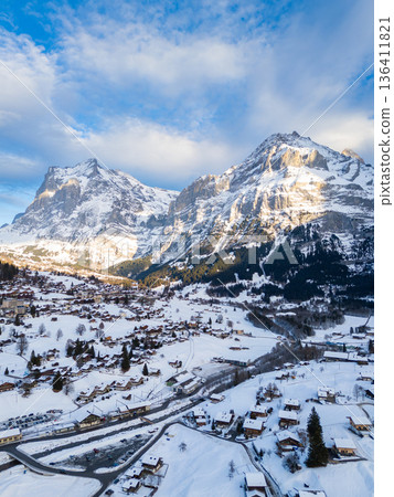 Wetterhorn and Schreckhorn Mountains and Grindelwald Town in Winter. Switzerland Wetterhorn and Schreckhorn Mountains and Grindelwald Town in Winter. Switzerland 136411821