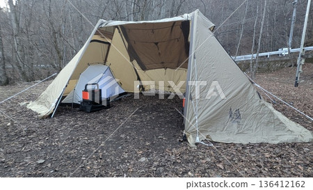 Solo camping tent set up at the campsite Solo camping tent set up at the campsite 136412162