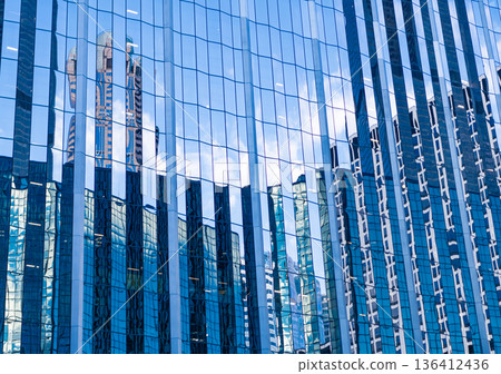 Architecture. Building facade architecture. Building background. Glass building window. Architectural detail. Background of architecture. Modern glass background. Glass background. Modern backdrop Architecture. Building facade architecture. Building background. Glass building window. Architectural detail. Background of architecture. Modern glass background. Glass background. Modern backdrop 136412436
